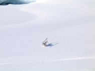 Thursday, 3-11-2004  Helicopter on a frozen glacier lake.